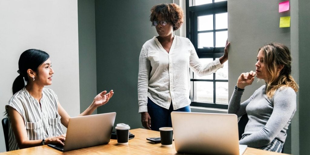 How To Find Success - Three Women in a Meeting