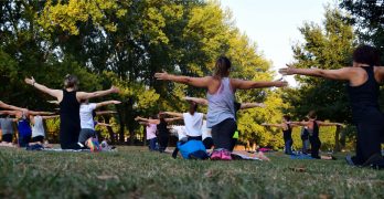 Women Practicing Yoga Outside