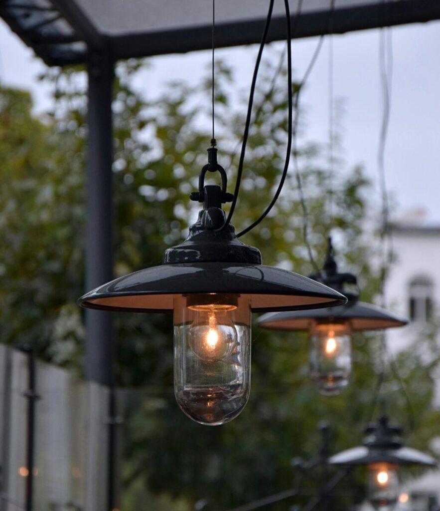 Stylish outdoor lamps illuminating a cozy evening ambiance.