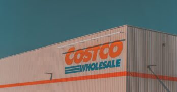 a building with a sign that says costco whole sale