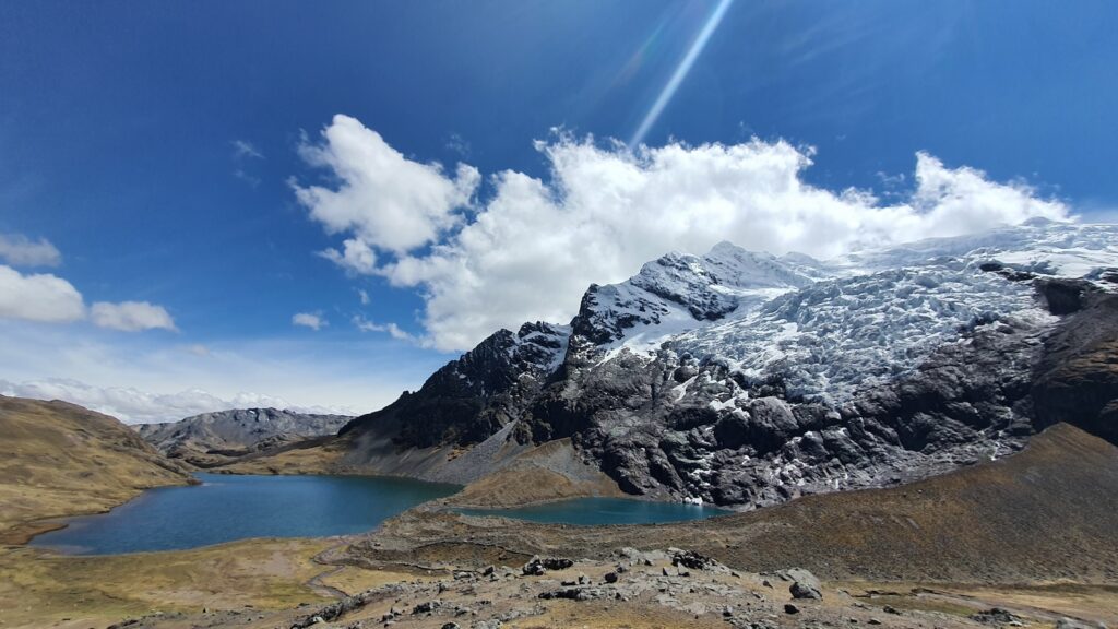 a mountain with a lake in the middle of it
